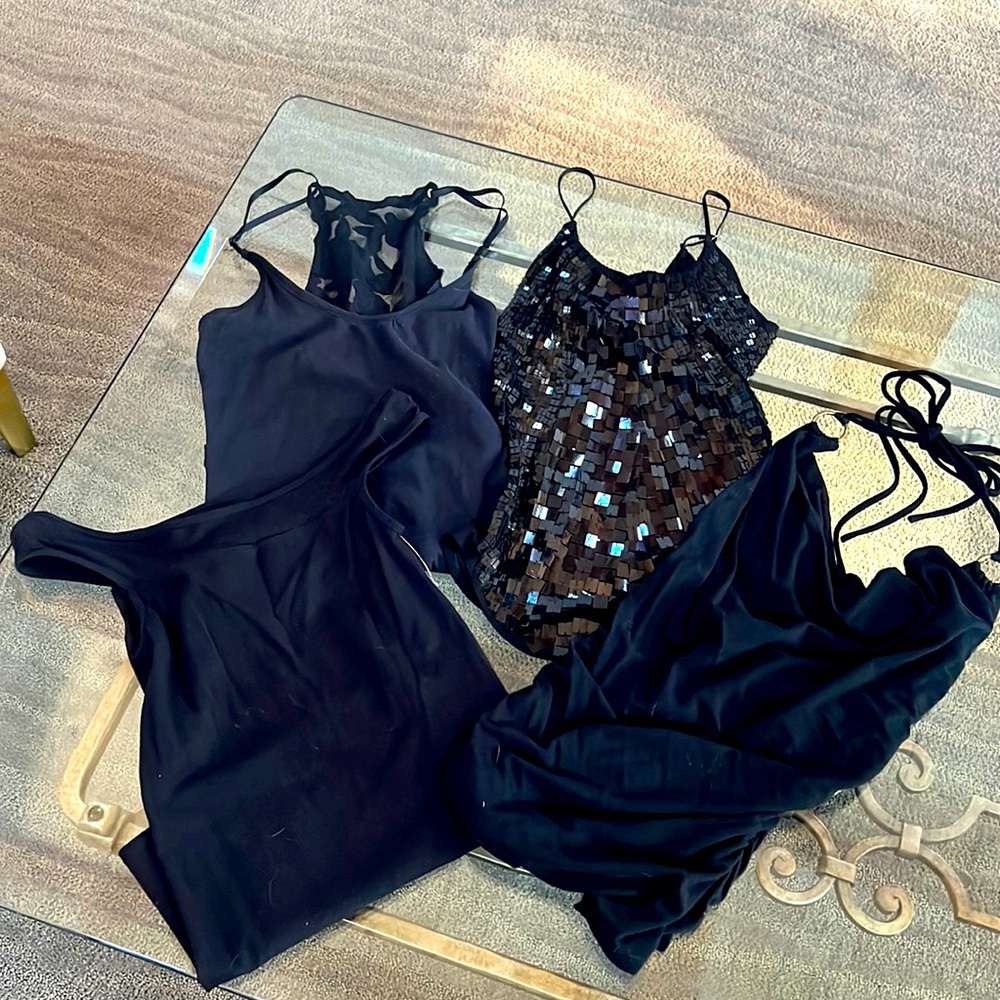 Four black tank tops, worn once!